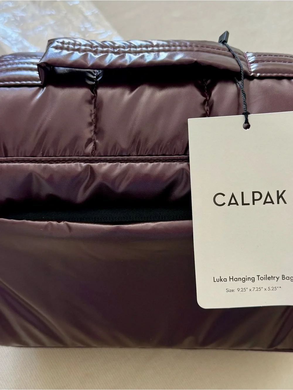 Calpak Luka Hanging Toiletry Bag in Glazed Dark Cherry!